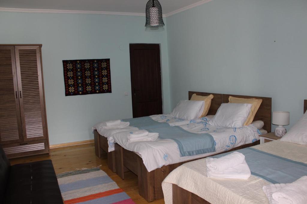 Postel nebo postele na pokoji v ubytování Village House