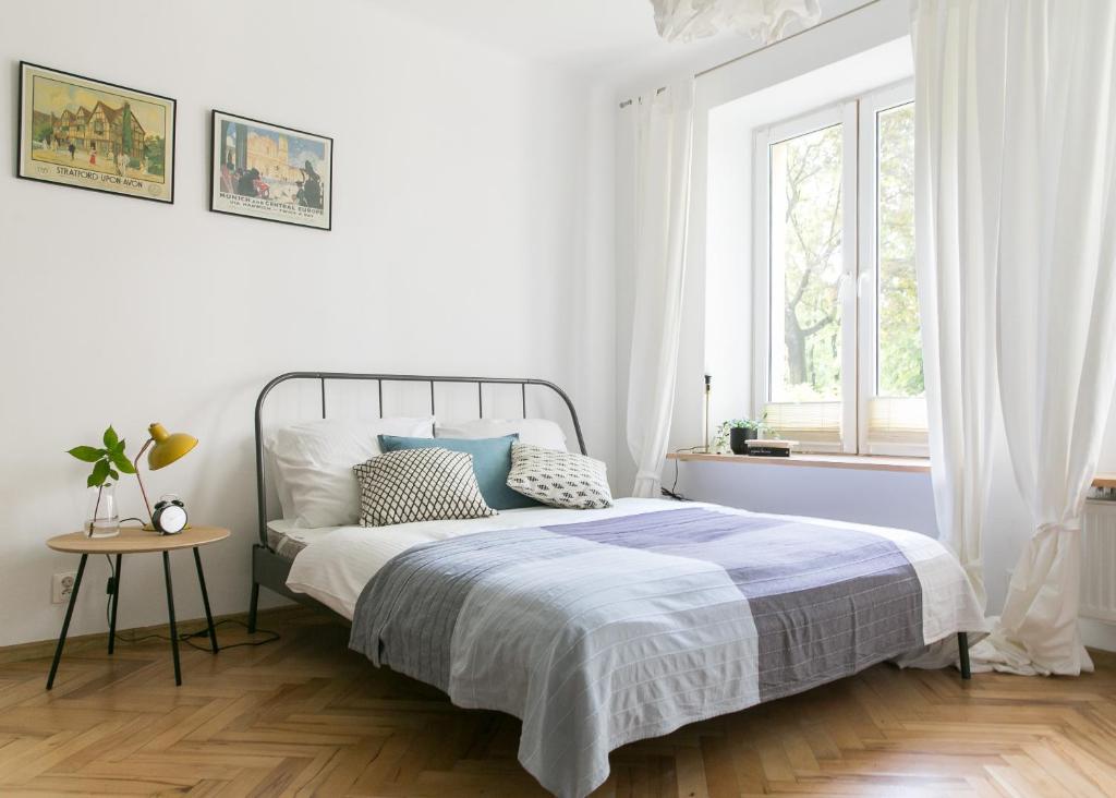 Posteľ alebo postele v izbe v ubytovaní Bednarska Apartment