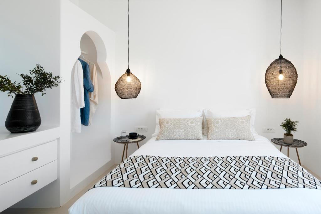 Łóżko lub łóżka w pokoju w obiekcie Star Infinity Suites