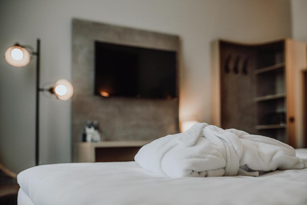 Postel nebo postele na pokoji v ubytování Hotel Westerkamp