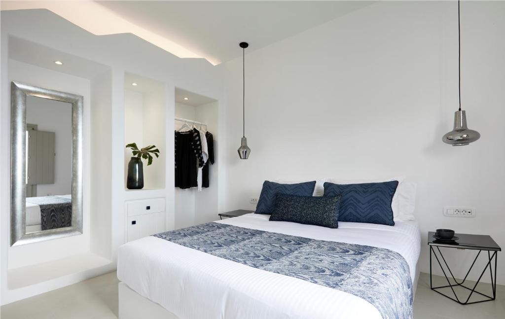 Łóżko lub łóżka w pokoju w obiekcie Star Infinity Suites