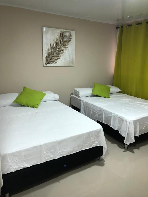 Cama o camas de una habitación en Tropical Dreams