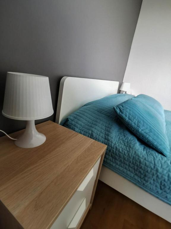 Posteľ alebo postele v izbe v ubytovaní Sky Apartments - Łagiewniki
