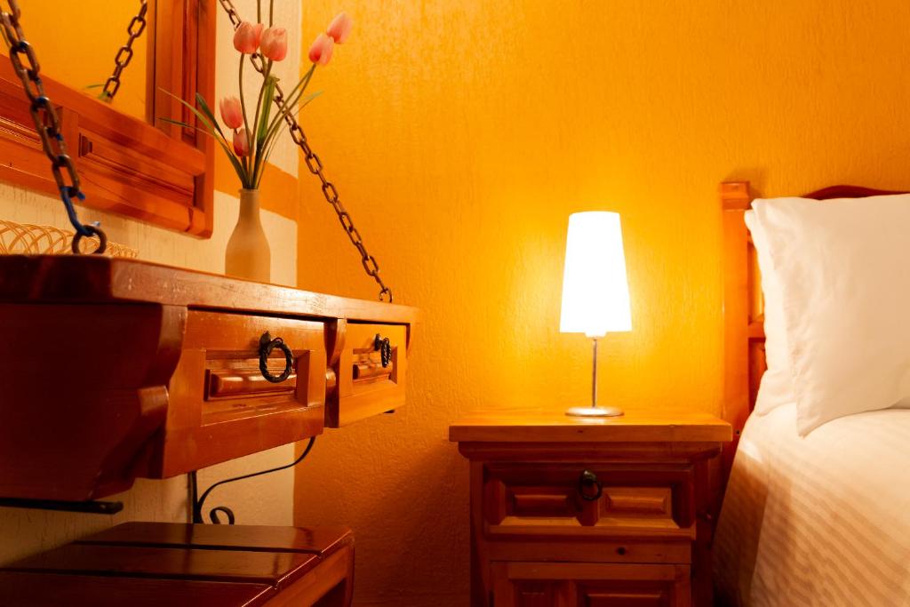 Postel nebo postele na pokoji v ubytování Casablanca Hotel Tula