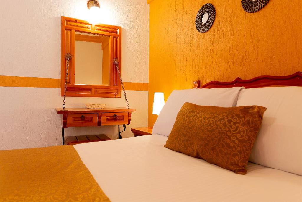 Postel nebo postele na pokoji v ubytování Casablanca Hotel Tula