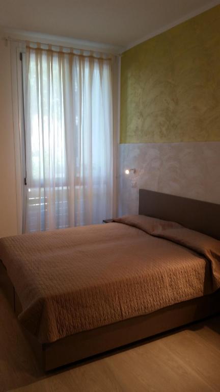 Llit o llits en una habitació de Hotel Stella Polare