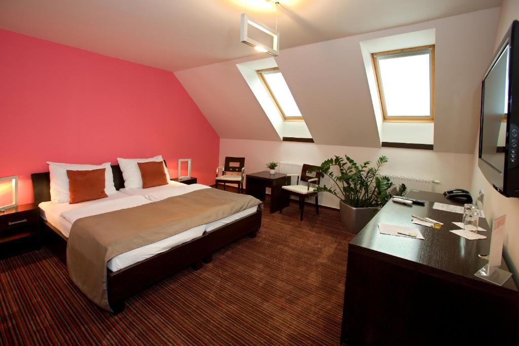 Postel nebo postele na pokoji v ubytování Hotel Lahofer