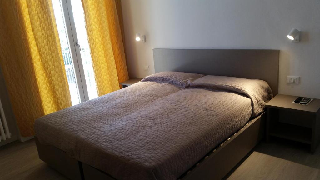 Llit o llits en una habitació de Hotel Stella Polare