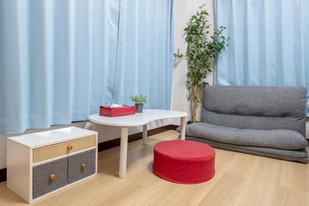 Posezení v ubytování Uhome Tabata Apartment