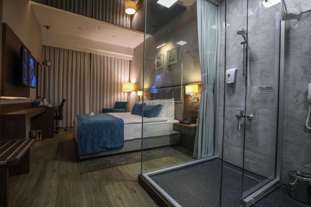 Postel nebo postele na pokoji v ubytování Best Western Premier Karsiyaka Convention & Spa Hotel