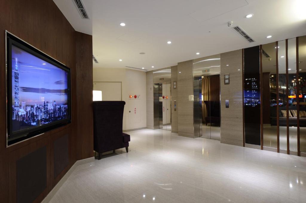 TV a/nebo společenská místnost v ubytování K Hotel Taipei Dunnan