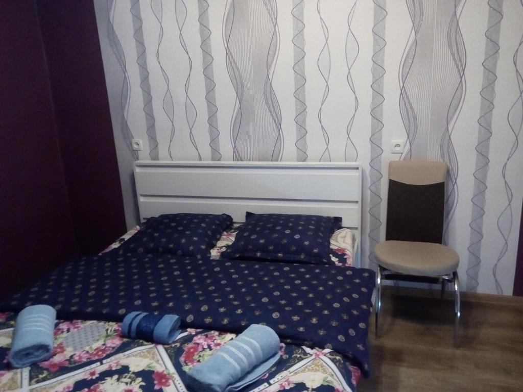 Llit o llits en una habitació de Best Host