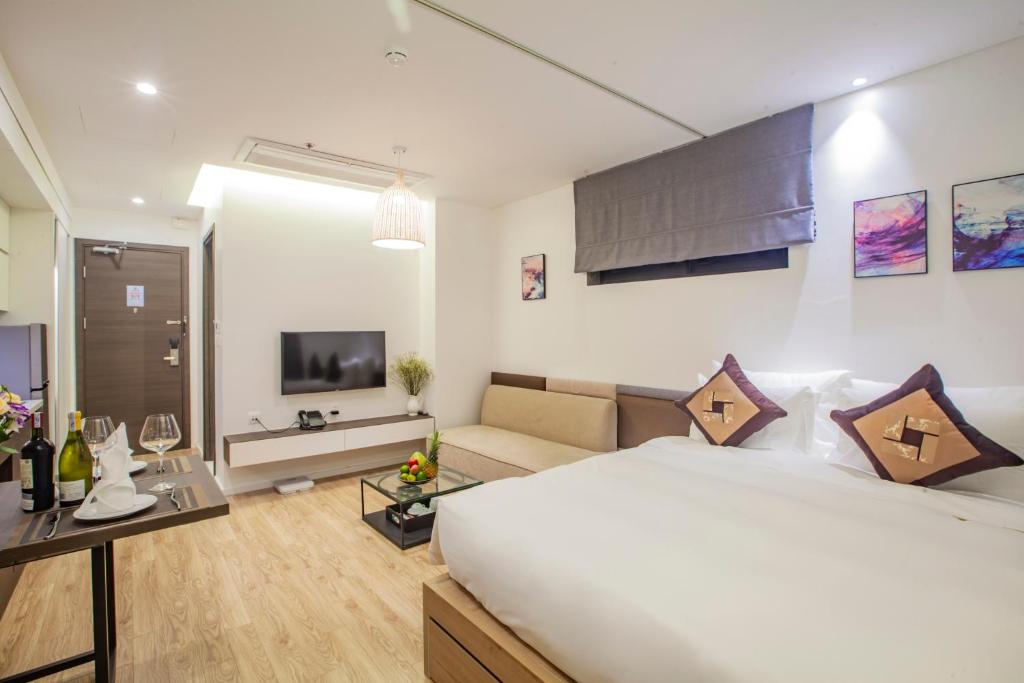 TV a/nebo společenská místnost v ubytování Parosand Hanoi Hotel