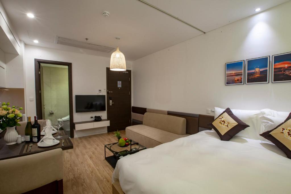 TV a/nebo společenská místnost v ubytování Parosand Hanoi Hotel