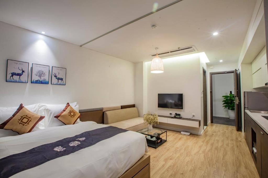 TV a/nebo společenská místnost v ubytování Parosand Hanoi Hotel