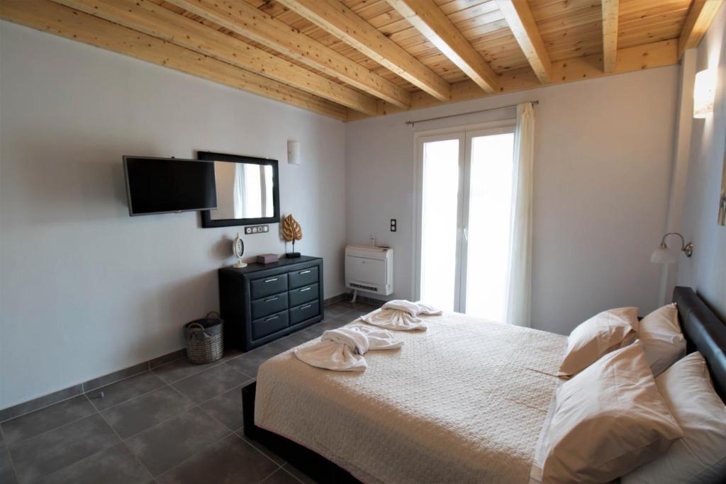 Postel nebo postele na pokoji v ubytování Villa de la Mer