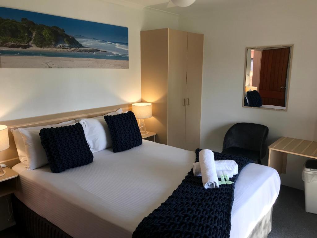Postel nebo postele na pokoji v ubytování OCEAN BREEZE MOTEL