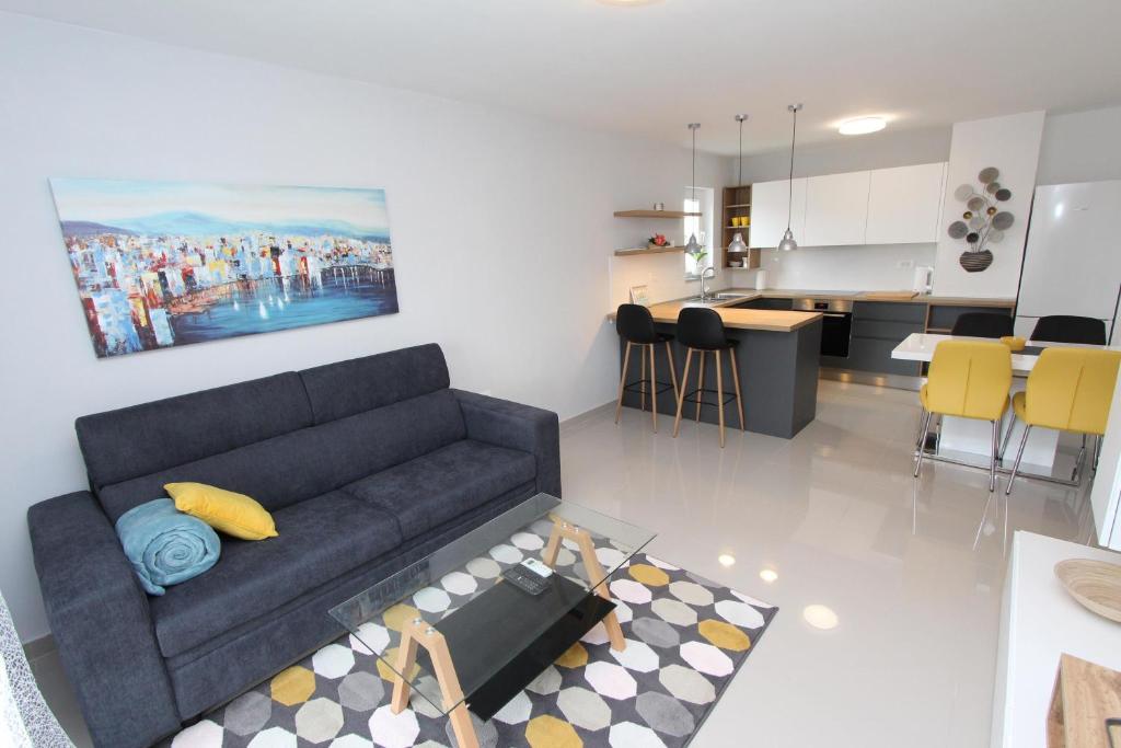 Kuchyňa alebo kuchynka v ubytovaní Apartment Sorriso 2