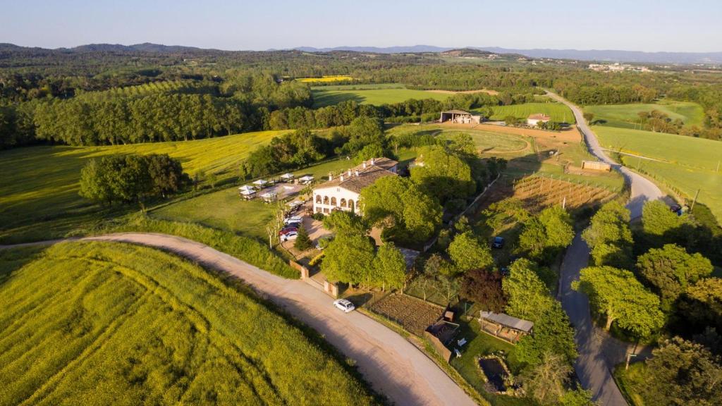 an aerial view of a house in a field at Mas Duc in Brunyola