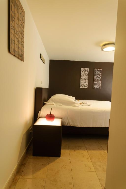 Postel nebo postele na pokoji v ubytování Hotel Pracha