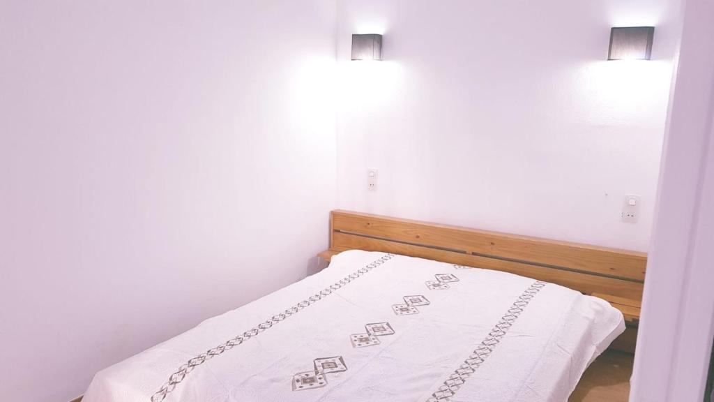 Postel nebo postele na pokoji v ubytování Res. Baie 18