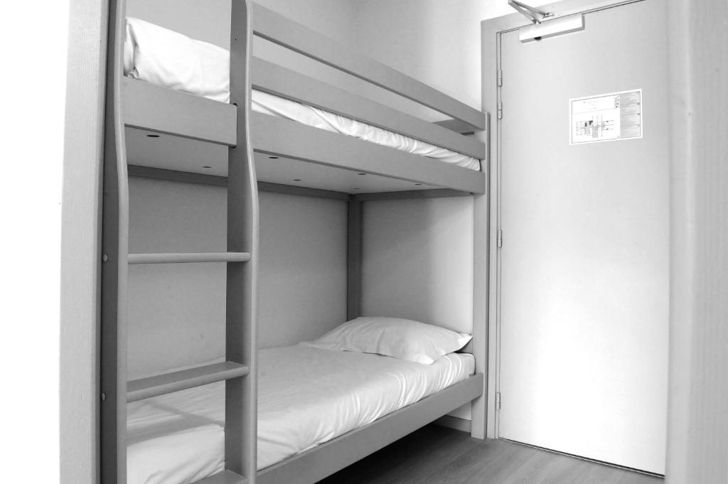 Postel nebo postele na pokoji v ubytování Hotel & Appartements Gochoki