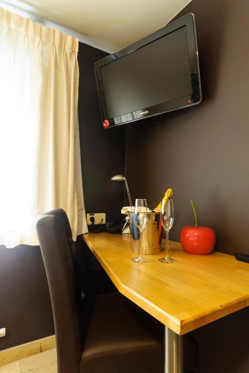 TV a/nebo společenská místnost v ubytování Hotel Pracha