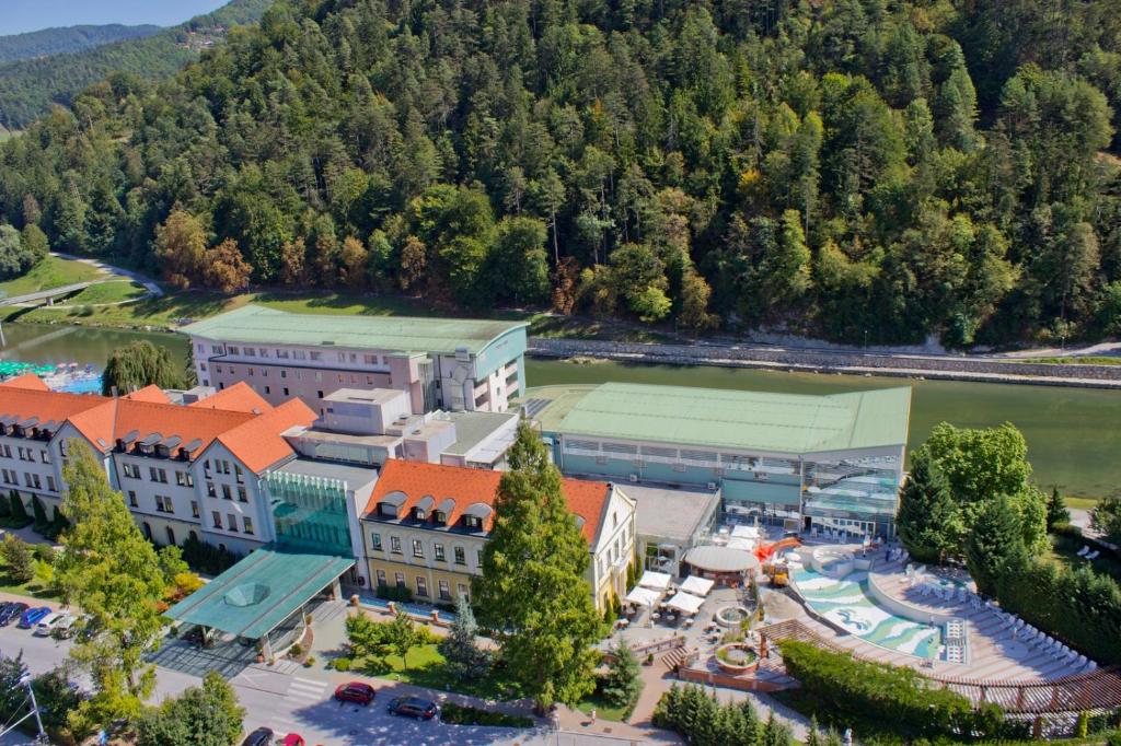 an overhead view of a town with a park and buildings at Hotel Zdravilisce - Thermana Lasko in Laško