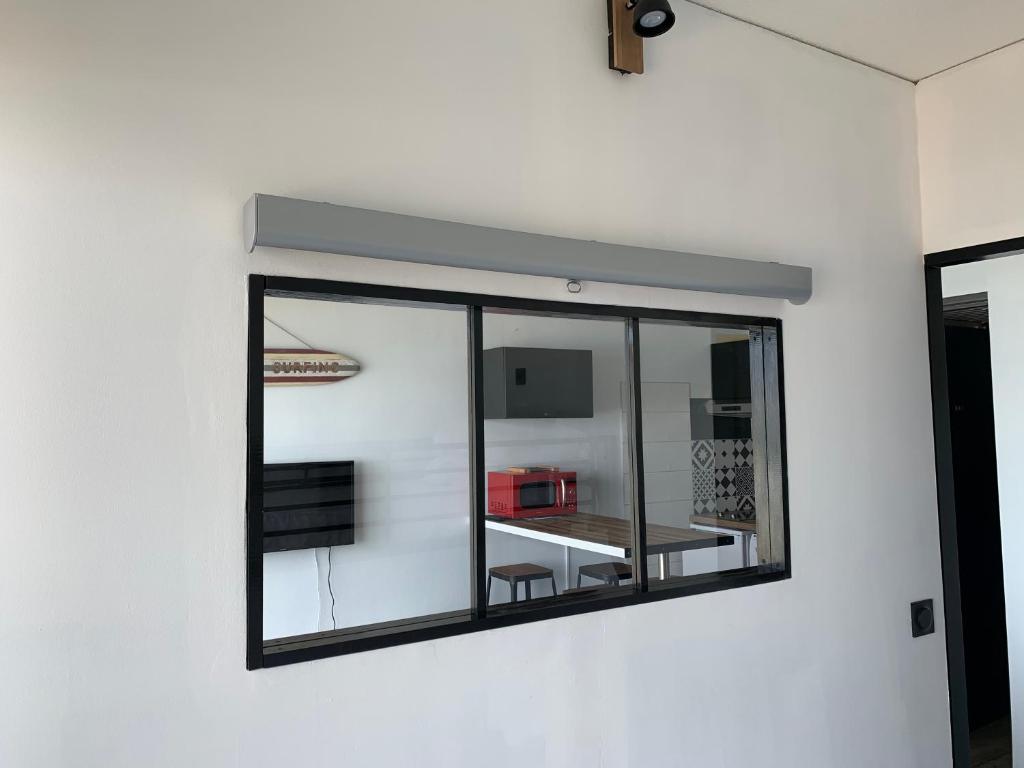 Een keuken of kitchenette bij LACANAU FRONT DE MER