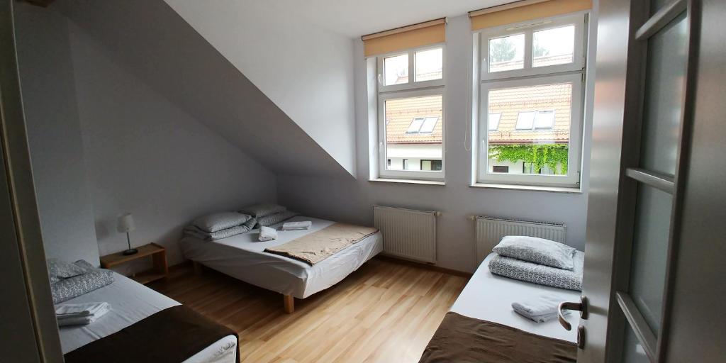 Een bed of bedden in een kamer bij 999 Aparthostel