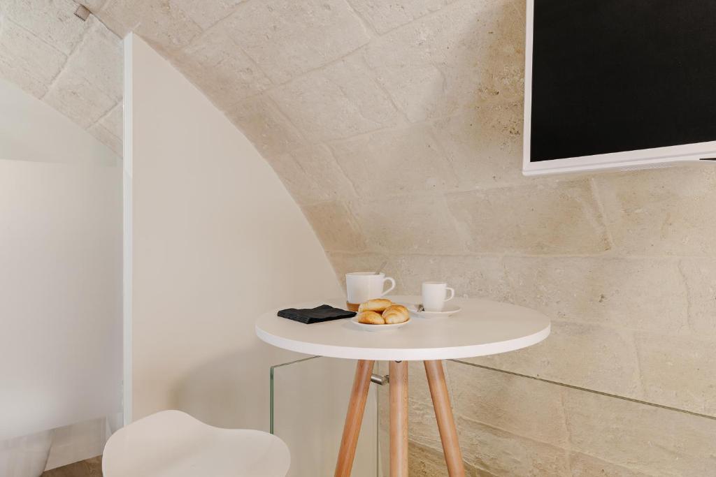 TV a/nebo společenská místnost v ubytování Hydria Rooms
