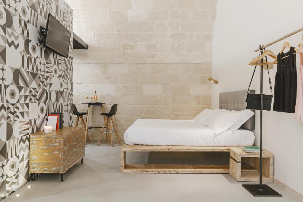 Postel nebo postele na pokoji v ubytování Hydria Rooms