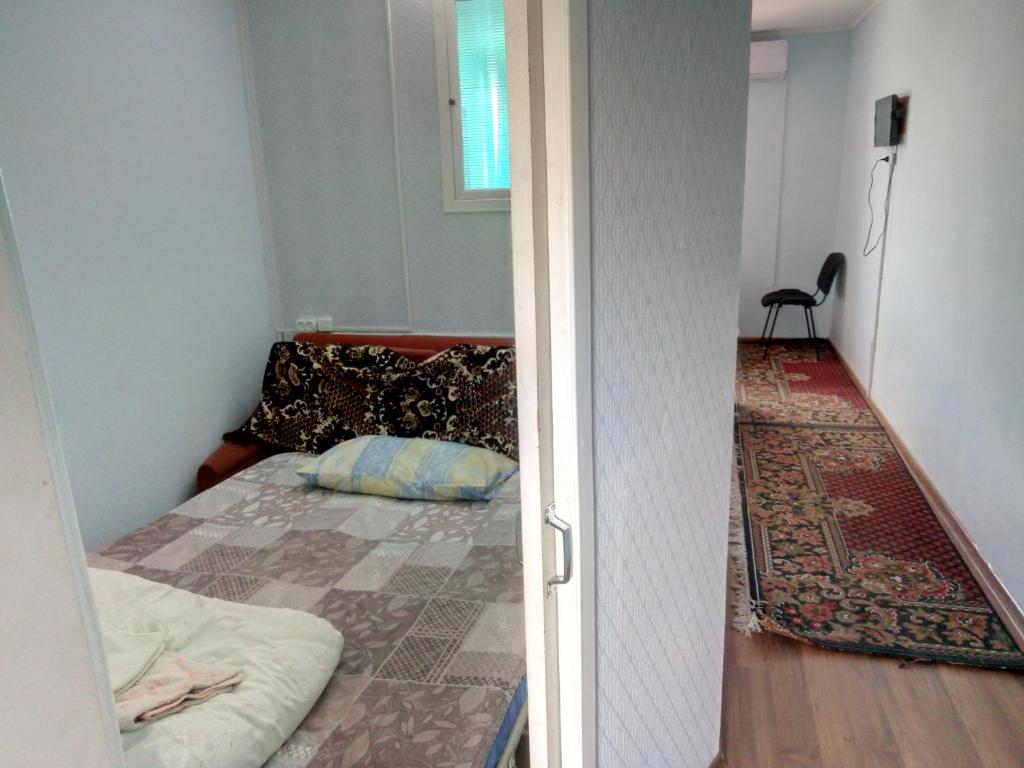 Postel nebo postele na pokoji v ubytování Hotel Uyut