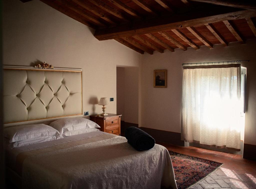 Posteľ alebo postele v izbe v ubytovaní Bella di Ceciliano