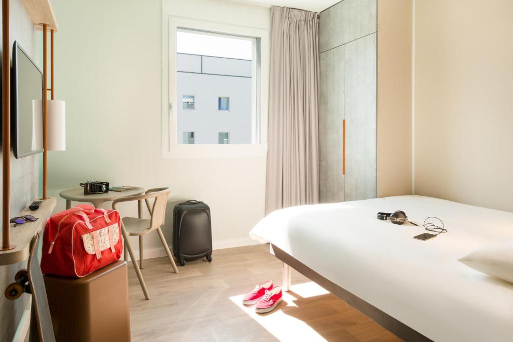 Voodi või voodid majutusasutuse ibis budget Fribourg toas
