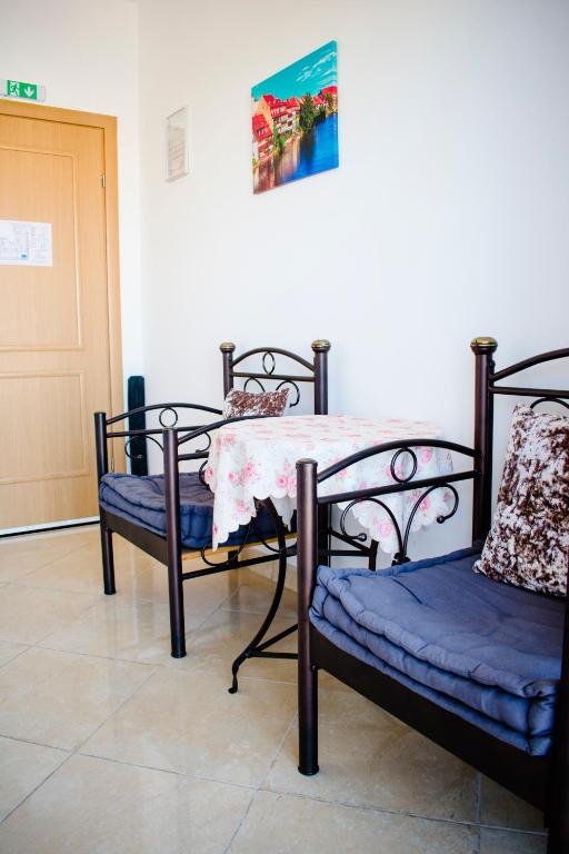Postel nebo postele na pokoji v ubytování Nikolakakis Rooms Lavrio