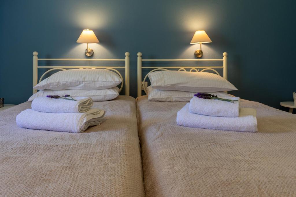 Postel nebo postele na pokoji v ubytování Kapella Apartments