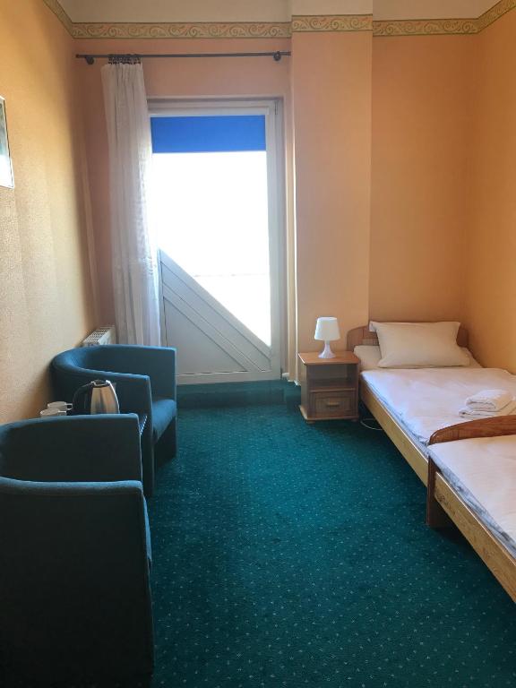 Postel nebo postele na pokoji v ubytování Zajazd Dajana