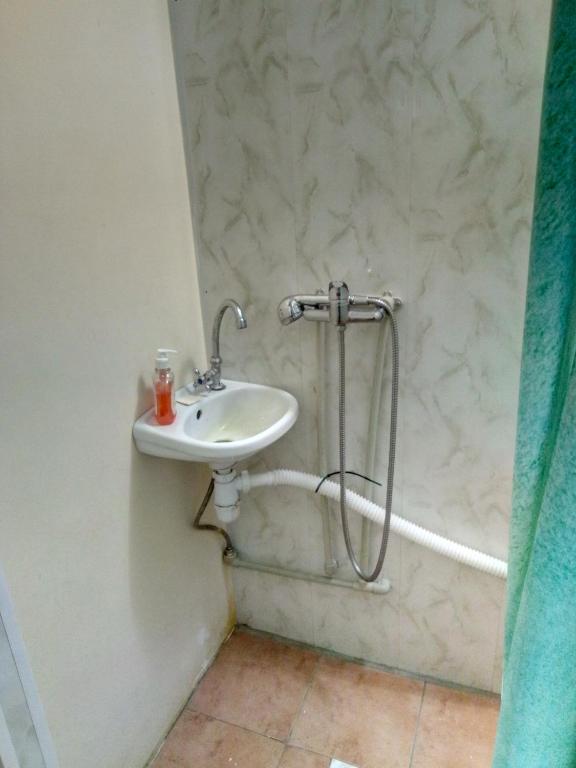 Koupelna v ubytování Hotel Uyut