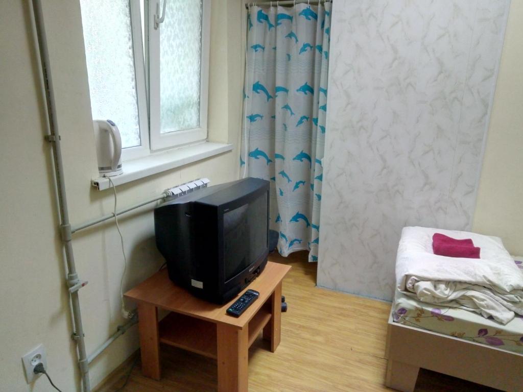 TV a/nebo společenská místnost v ubytování Hotel Uyut