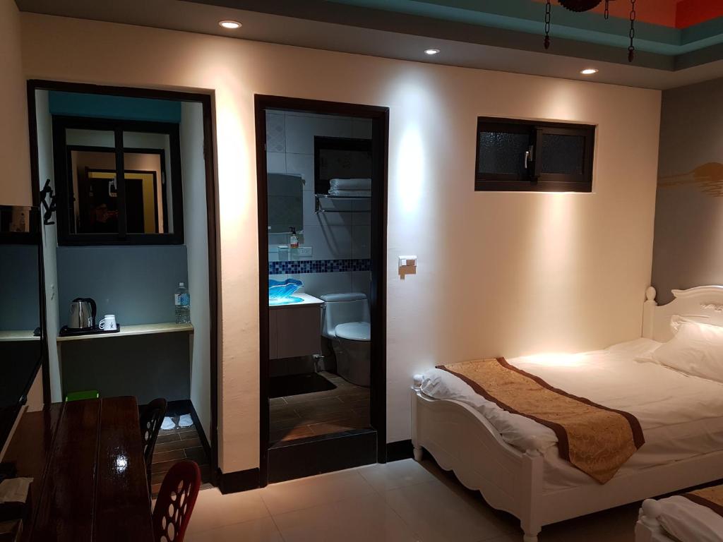Postel nebo postele na pokoji v ubytování DuGu Hostel