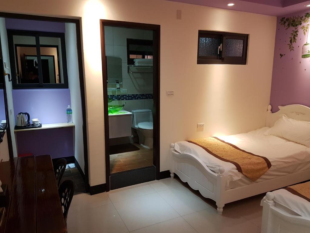 Postel nebo postele na pokoji v ubytování DuGu Hostel