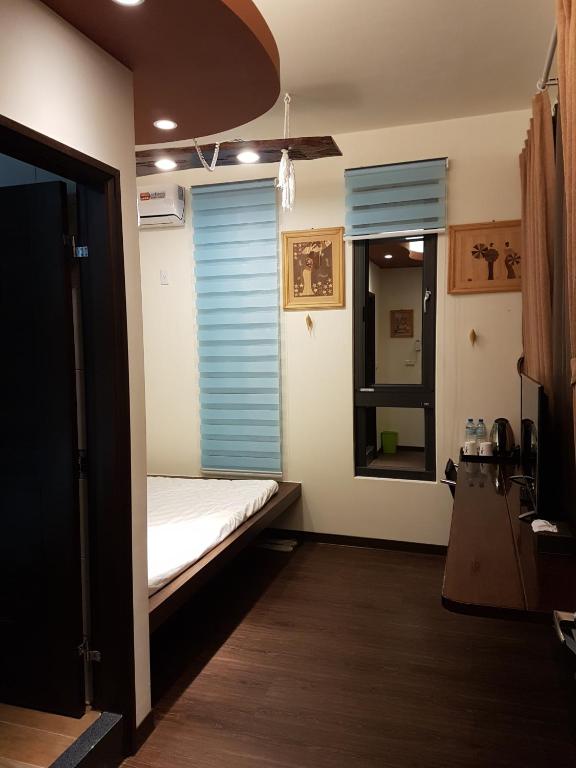 Postel nebo postele na pokoji v ubytování DuGu Hostel