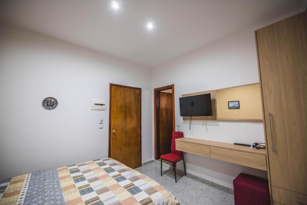 Telewizja i/lub zestaw kina domowego w obiekcie Hotel Dimitra Sun