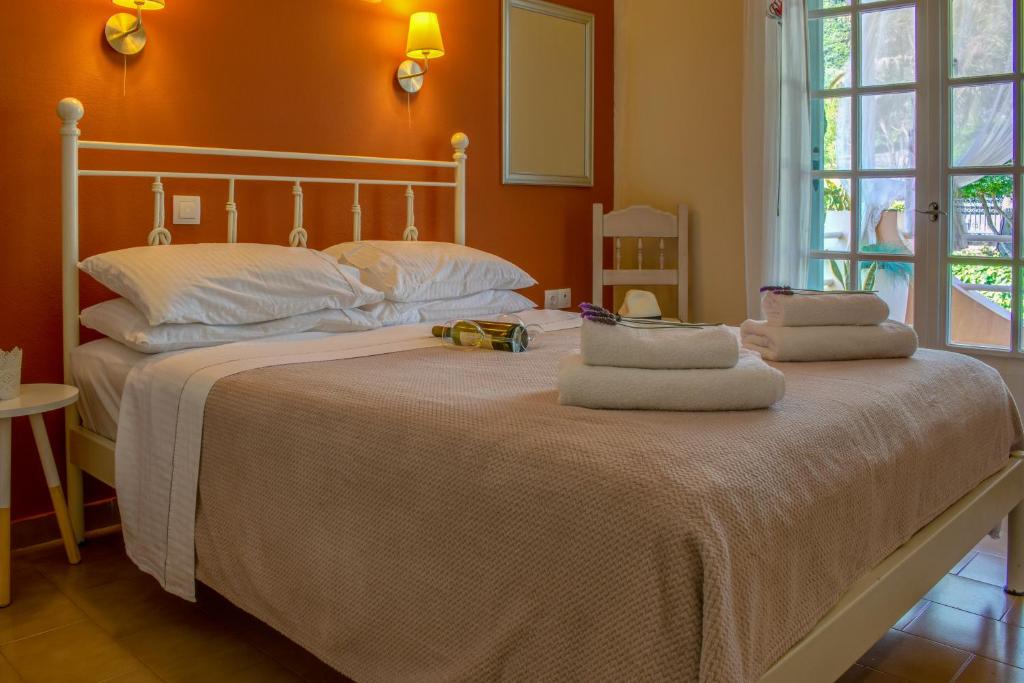 Postel nebo postele na pokoji v ubytování Kapella Apartments