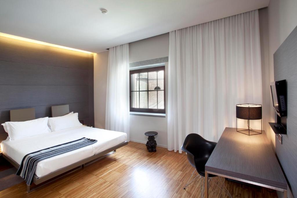 Postel nebo postele na pokoji v ubytování Alter Hotel