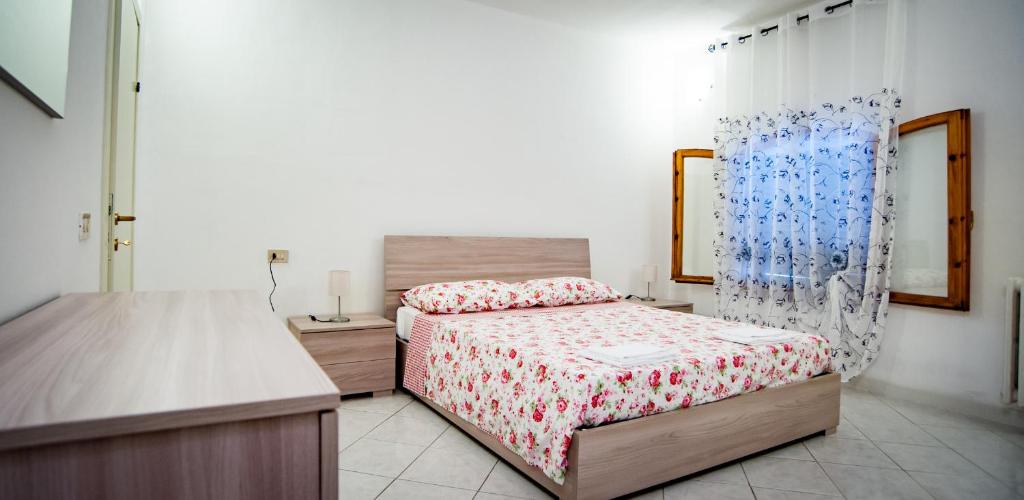 Posteľ alebo postele v izbe v ubytovaní Agriturismo Il Maremmano