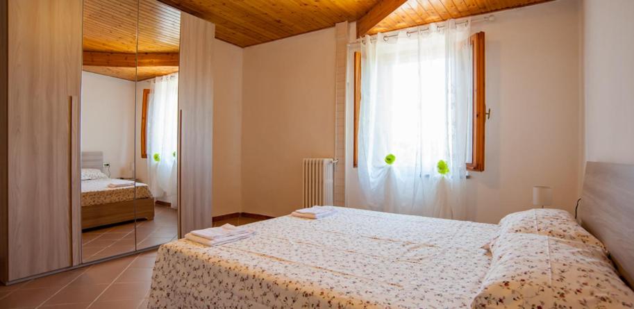 Posteľ alebo postele v izbe v ubytovaní Agriturismo Il Maremmano