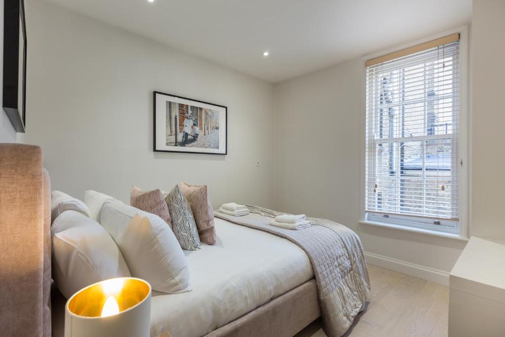 Postel nebo postele na pokoji v ubytování Prime Apartments in Covent Garden