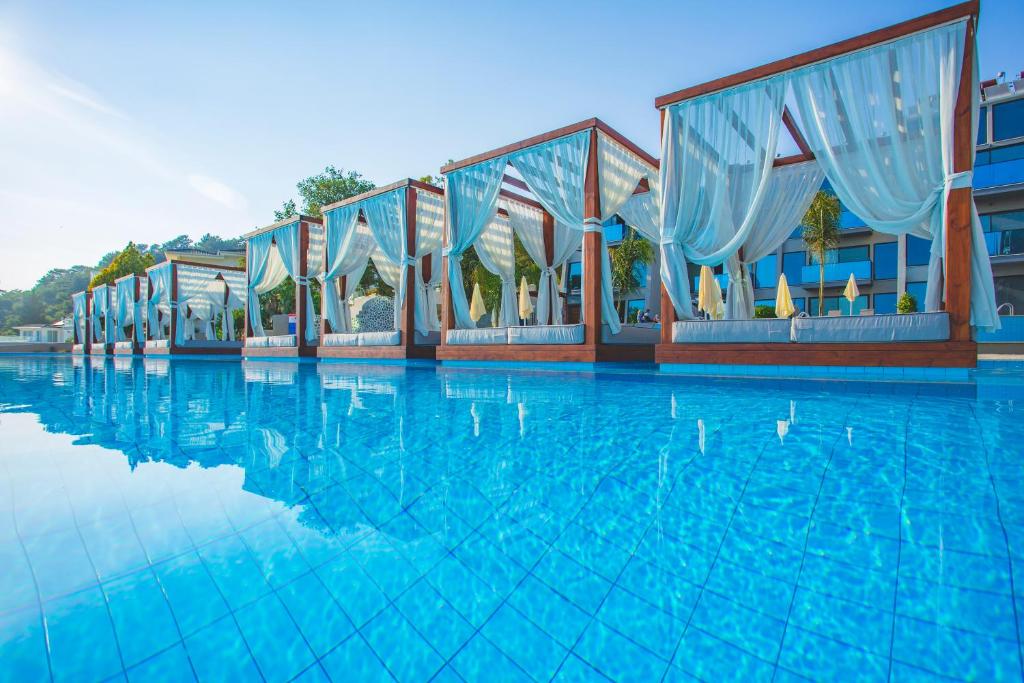 The swimming pool at or close to Orka Cove Hotel Penthouse & Suites Adults Only